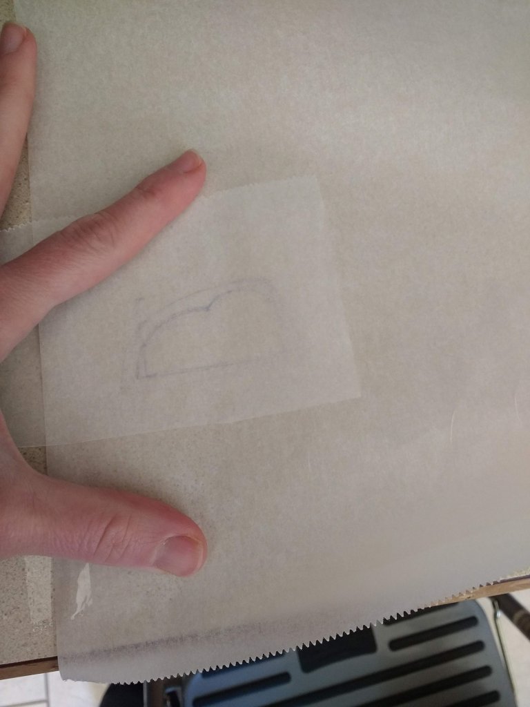 plasarea designului sub hârtie pergament